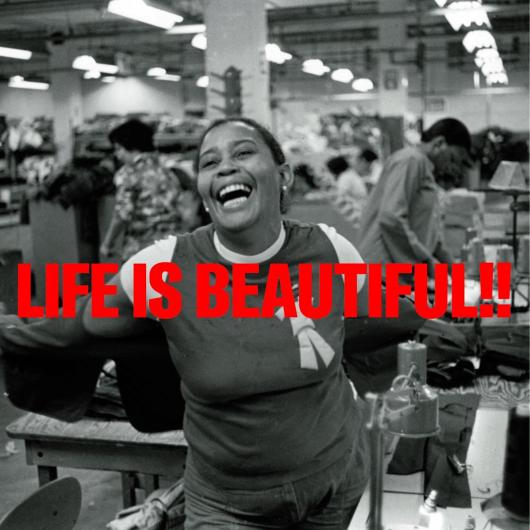 happy woman stands at center. Bold text in front of her says, "Life is Beautiful!"